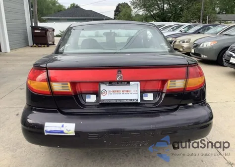 1999 Saturn Sc1 z USA, uszkodzony, nr VIN 1G8ZP1283XZ324457